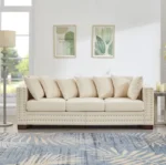 Goldoma convertible velvet loveseat sofa in apricot with tufted back and silver nailheads