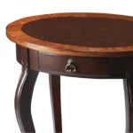 Goldoma brown wood oval coffee table with drawer and shelf in a farmhouse living room