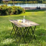 Goldoma 5-Piece Folding TV Tray Table Set in slate finish, nested together in a space-saving design