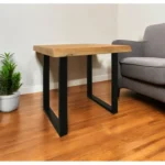 24-inch square end table with natural distressed solid wood top and black iron base against a neutral wall