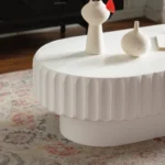 Modern oval fluted storage coffee table with lift-off lid in cream white MDF