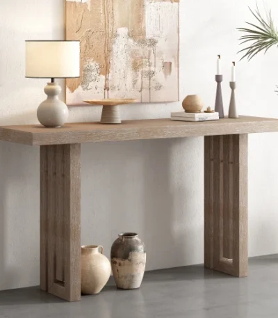 Modern oak veneer console table with distinctive side shapes in entryway