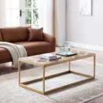 Natural solid wood coffee table with metal base in a living room setting