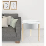 Goldoma round end table in brown and white solid wood placed in a living room