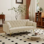Modern 72-inch convertible sofa bed velvet tufted loveseat in beige, converted to bed mode in a living room