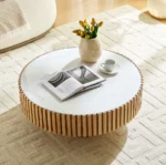 Goldoma nesting round coffee table with sintered stone top in a modern living room setting