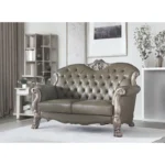 Goldoma 71-inch bone faux leather loveseat with tufted backrest, square arms, and toss pillows