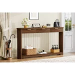 Modern console table with wavy patterned front and two storage drawers in a living room setting