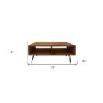 Goldoma 23-inch industrial coffee table with storage shelf, brown wood top and black metal frame in a living room