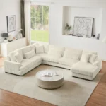 Goldoma 101.2-inch beige corduroy sectional sofa with deep seating and side pockets in a living room