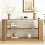 Goldoma solid wood console table with open shelves in a modern entryway