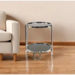 Goldoma 22-inch silver mirrored glass end table with shelf in a living room setting
