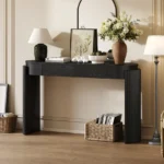 Modern fluted wood console table with natural oak finish and storage in entryway