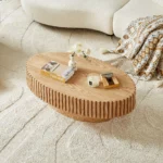 Goldoma modern oval coffee table with sturdy pedestal base in living room