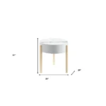 Goldoma round end table in brown and white solid wood placed in a living room