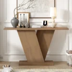 Modern solid wood console table with V-base and storage shelf in a living room