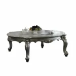 Goldoma 36-inch white resin and wood coffee table with lower storage shelf in living room
