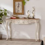 Goldoma French vintage carved distressed white console table in entryway with decor