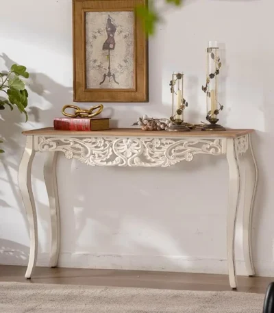 Goldoma French vintage carved distressed white console table in entryway with decor