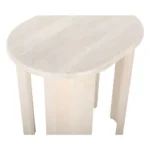 Goldoma natural solid wood oval end table with wabi-sabi farmhouse finish placed beside a sofa in a living room