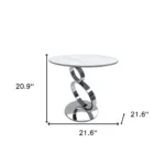 Goldoma 21 inch round pedestal end table with white faux marble top and silver stainless steel base in a living room setting