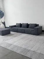 Goldoma L-Shape Corduroy Velvet Modular Sofa in a modern living room
