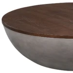 Goldoma 48-inch round solid wood and concrete coffee table with brown top and gray base in a living room