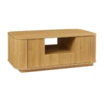 Modern oval coffee table with drawers and shelf in natural solid wood placed in living room