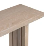 Modern oak veneer console table with distinctive side shapes in entryway
