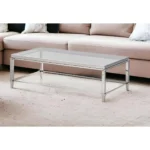 Goldoma 55-inch clear glass coffee table with silver steel frame in modern living room setting