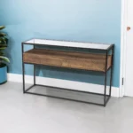 Goldoma 48-inch glass console table with black metal frame and lower shelf in modern living room