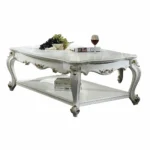 Goldoma 36-inch white resin and wood coffee table with lower storage shelf in living room