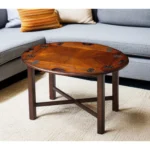 Goldoma 30-inch oval mango wood coffee table with brown top and dark brown base in a living room