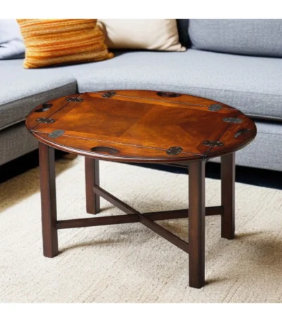 Goldoma 30-inch oval mango wood coffee table with brown top and dark brown base in a living room