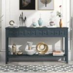 Goldoma rustic navy console table with four drawers and bottom shelf in a living room setting