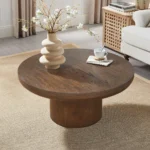 Goldoma round coffee table with wood veneer top and cylindrical legs in dark brown, modern style for living room