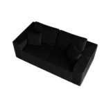 Goldoma modular loveseat sofa bed in black corduroy upholstery with iron legs, showing sofa bed conversion for small spaces
