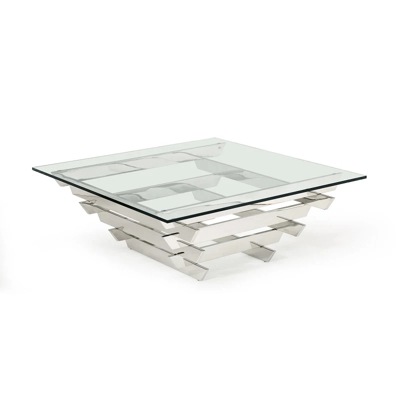 H8f90911e6a0b4d2687f02279f7761abe6.webp Goldoma 39-inch square glass coffee table with stainless steel sled base and lower shelf in a modern living room setting