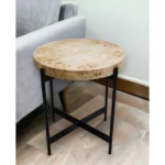 Goldoma 22-inch black and brown burl wood round end table with black metal base in a living room setting