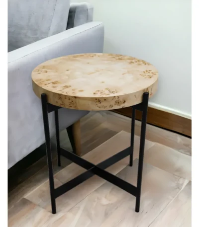 Goldoma 22-inch black and brown burl wood round end table with black metal base in a living room setting