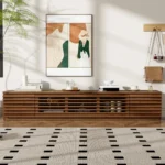 Modern wood TV stand for TVs up to 80 inches with cable management and soft-close hinges in a living room