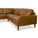 Goldoma London right facing convertible sectional sofa bed in tan PU leather with chenille fabric, L-shaped modern design