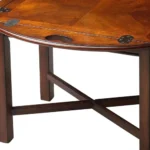 Goldoma 30-inch oval mango wood coffee table with brown top and dark brown base in a living room