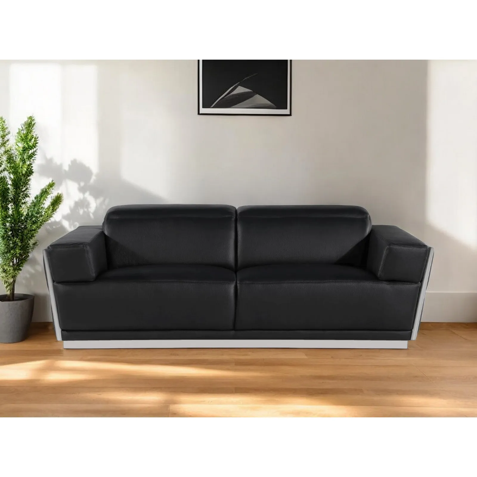 H9886b8c524594112a4022ea22c5b5246i.webp Genuine leather sectional sofa in black with silver trim, 89 inches wide, featuring tufted stitching and modern L-shape design