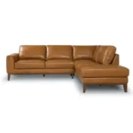 Goldoma London right facing convertible sectional sofa bed in tan PU leather with chenille fabric, L-shaped modern design