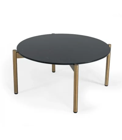 Goldoma 36-inch black and gold faux marble round coffee table in a modern living room setting