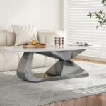 Modern sintered stone coffee table with stainless steel base in a stylish living room setting