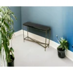 Goldoma 32-inch black and gold console table with stone top and iron frame in a living room entryway
