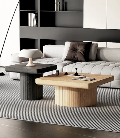 Goldoma modern nesting coffee table set in oak wood with cylindrical fluted pedestal on living room floor