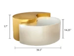 Modern gold coffee table with steel frame and metal top in a living room setting